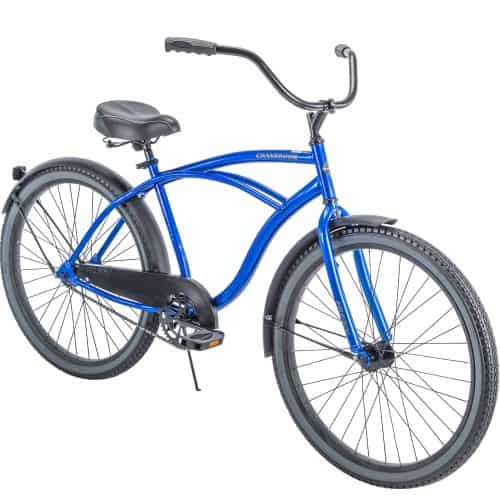 A blue bicycle is parked on the ground