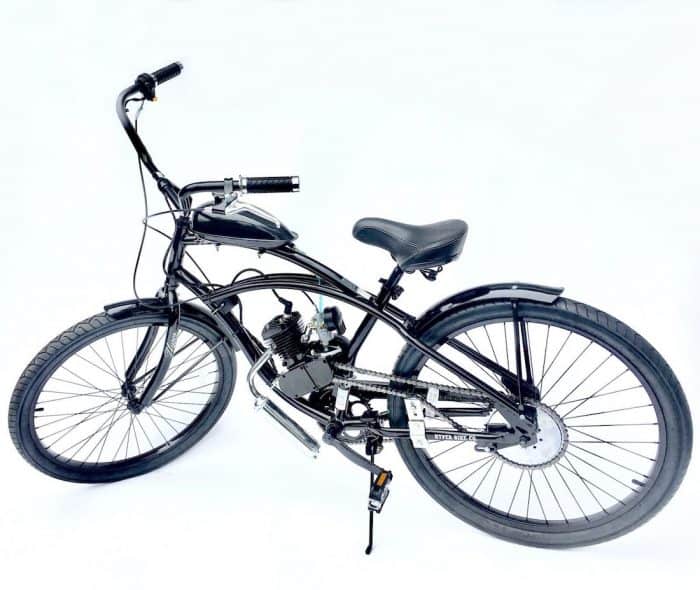 A bicycle with a motor attached to the front.