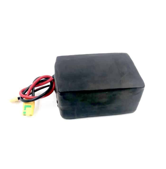 A black box with wires attached to it.