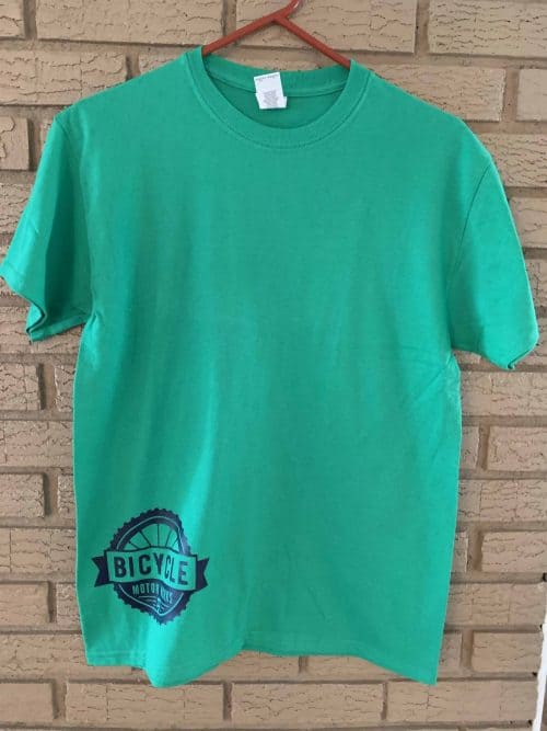 A green shirt with a bicycle logo on it.