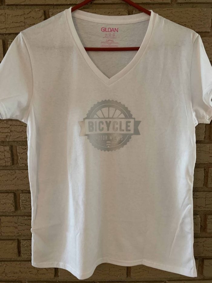 A white t-shirt with the word " bicycle ".