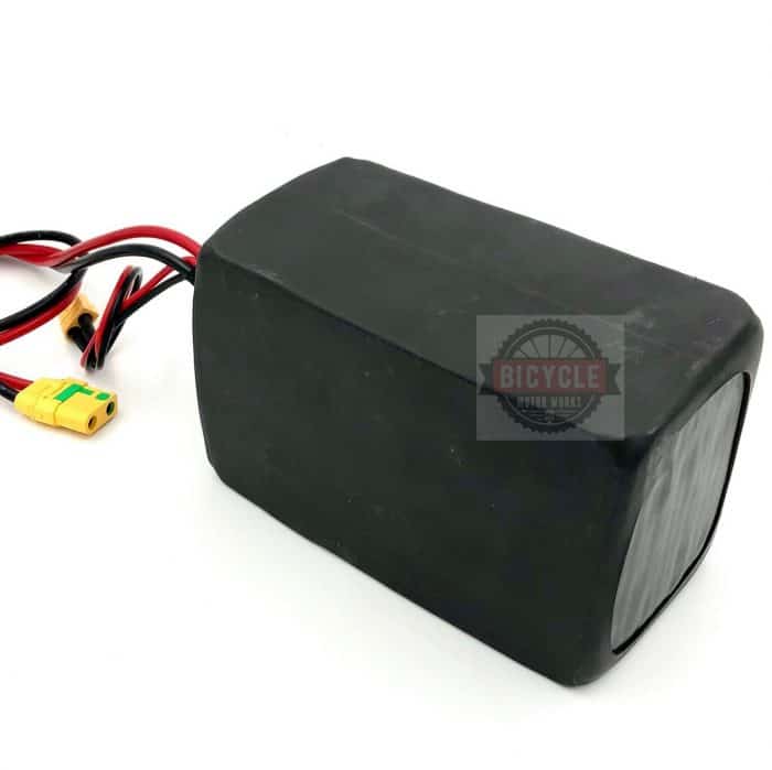 A black box with wires attached to it.