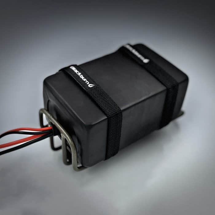 A black box with wires attached to it.