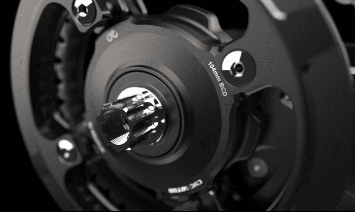 A close up of the front wheel on a motorcycle.