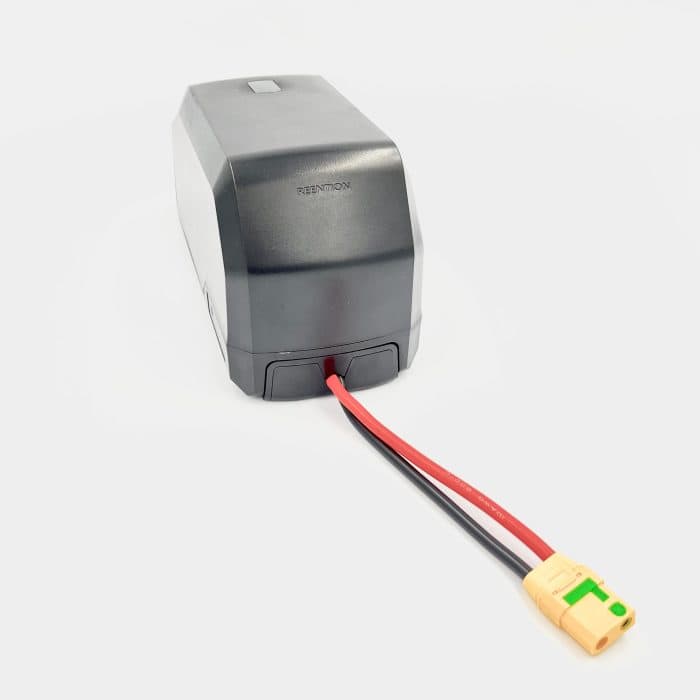 A small black box with wires attached to it.